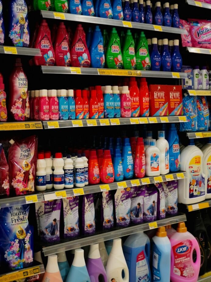 Shelves stocked with cleaning supplies and detergents