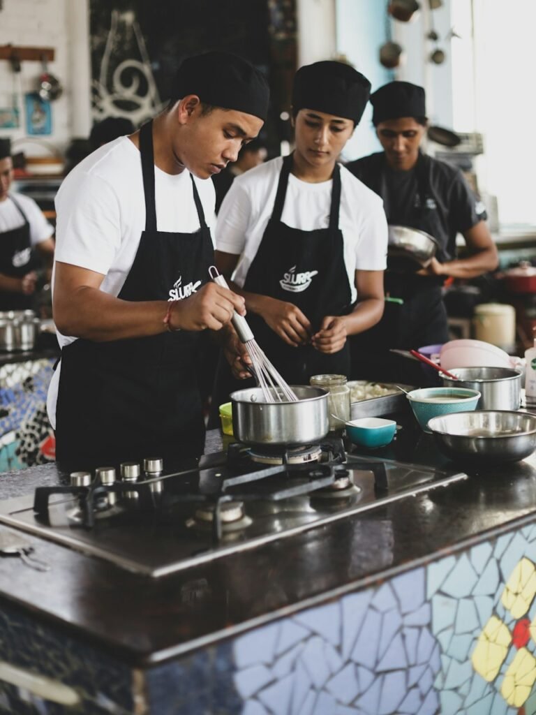 Team taking part in a culinary skills training class