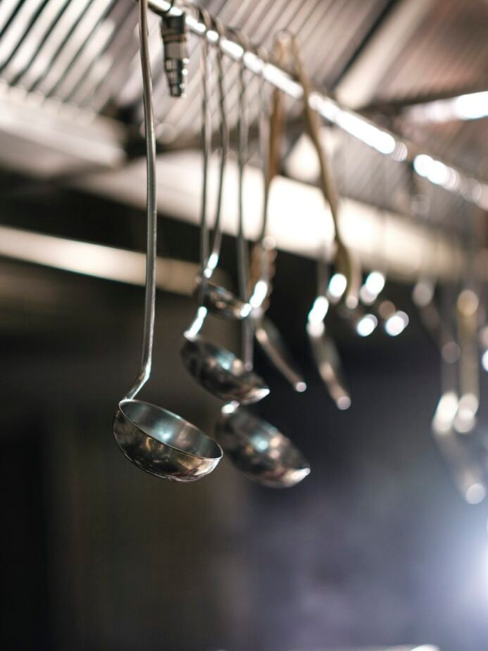Kitchen utensils in professional cooking space