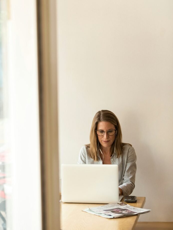 Hotel Staff Leave Application Format & Approval Checklist 1 Professional checking application paperwork at a desk