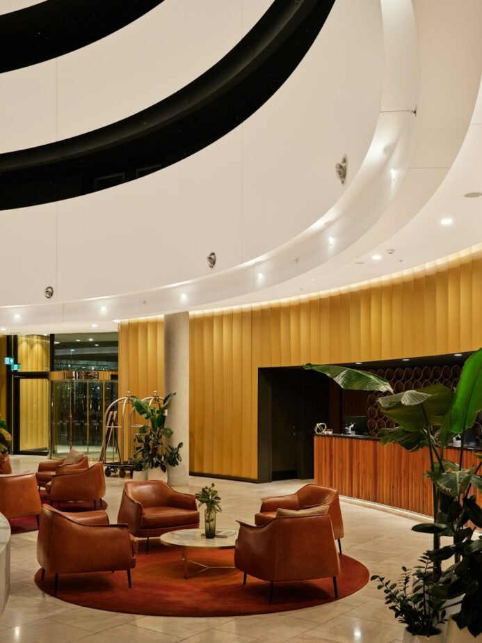 Hotel Duty Manager Job Description: Free Template, Duties & Hiring Test 1 Contemporary hotel reception lobby and seating