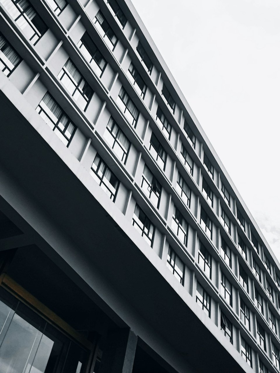 Hotel front desk and bright lobby